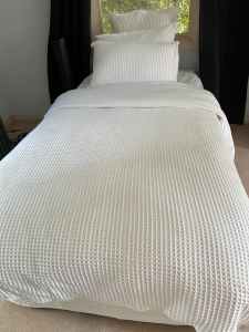 2 King Single Posturepedic beds with sheets and pillows $100 each