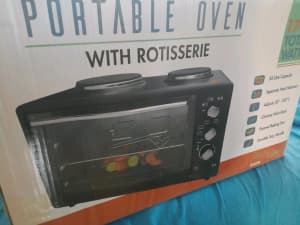 PORTABLE OVEN WITH ROTSSERIE