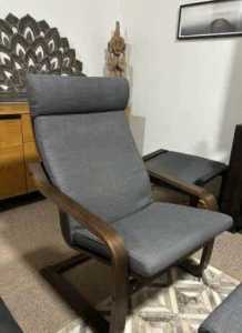 Brown armchair with dark grey cushions