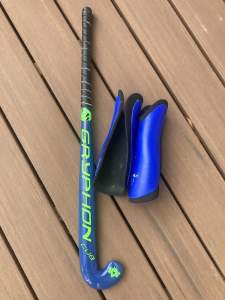 child size hockey stick and shin pads