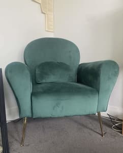 Green suede reading chair