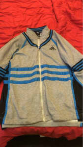 grey and blue striped adidas jacket