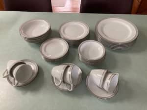 39 pieces Noritake dinner set. White with grey and silver trim. Knox