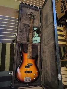 Bass guitar, case and 100w bass amp in good condition