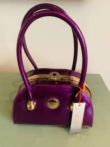 Handbag. Ladies. Brand: Peach. New with tags. $20. PU Ridgewood