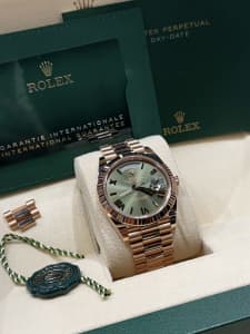 Rolex DAYDATE 40mm 228235 olive green dial rose gold