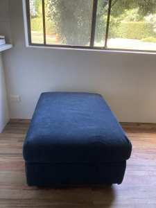 Large navy fabric ottoman with storage