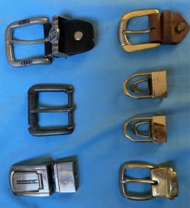 7 vintage belt buckles. Used condition.