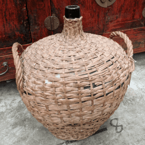 Large Antique Bottle With Woven Basket