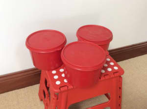 Three retro vintage red storage containers canisters