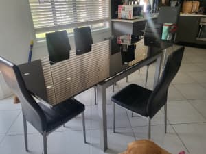 Black and silver glass dining suite