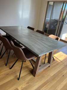 Concrete dining table with natural Ironbark hardwood legs