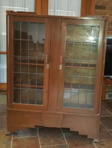 Antique lead-glass bookcase/display cabinet in good condition.