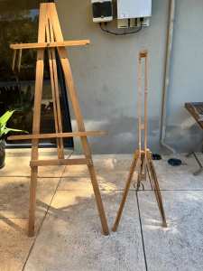 Two easels, fold down.