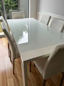 Glass top dining 6 seater dining table