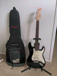Electric Guitar, Stand and Bag.