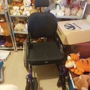 Purple and black wheelchair