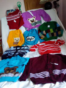 New hand knitted childrens jumpers various styles and colours