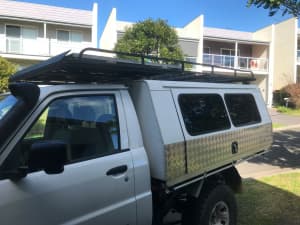 Canopy and ute tray for camping