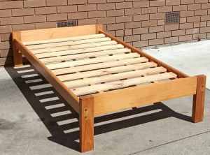 timber single bed and mattress, $140