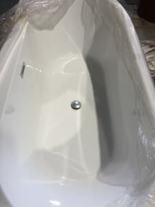 Bath tub. Brand new, flush wall design. White. 