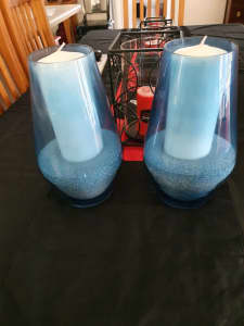 2 matching blue vases