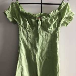 Green off the shoulder mini dress size 8