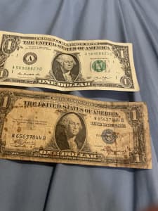 One dollar note and one old silver certificate
