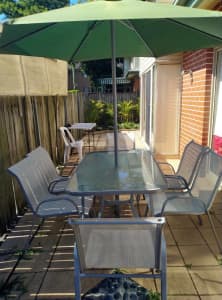 Don't miss this offer Outdoor table with 6 chairs. Umbrella included.