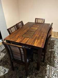 Wooden dinner table with 6 chairs