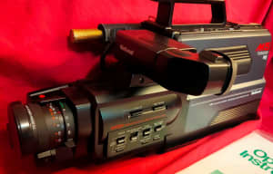 a Panasonic M5 VHS camcorder including AC adapter.