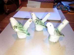 Three vintage little hand crafted ceramic bird whistle figurines 
