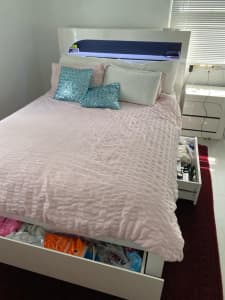 Queen bed with mattress almost new.