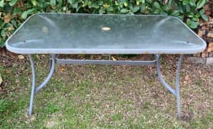 Outdoor dining table with six chairs. Good condition