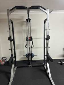 Squat and bench press power rack with high low double pulley system