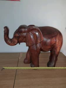 Hard wood elephant 1 solid piece
