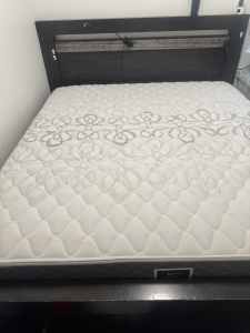 King size gas lift bed with near new mattress