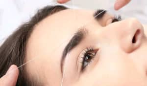Eyebrows / threading $6 just for women .