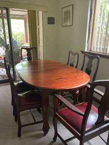 Wooden dining table (extendable), six chairs and matching sideboard