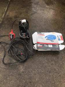 Ozito Submersible water Pump along with 25m hose