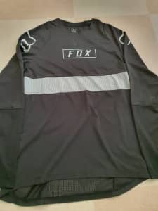 Fox Racing jersey and Troy Lee half zip tops