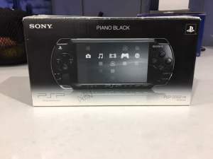 SONY PLAYSTATION PSP-2002 WITH BOX & 12 GAMES