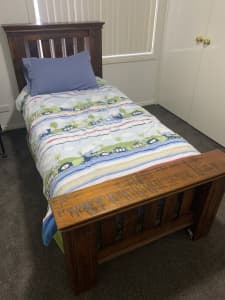 Single bed with pillow top mattress