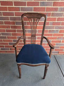 Excellent quality timber carver chair in navy velvet upholstery