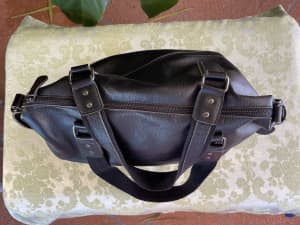 Unused black quality leather retro overnight/travel bag.As new
