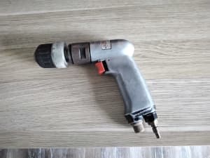 Pneumatic pistol grip drill