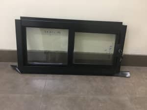 Black Sliding window 300Hx610W ,clear glass: located in Wetherill Park
