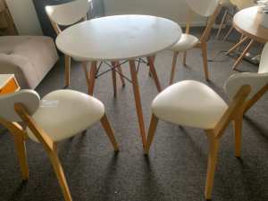 set of 4 Eames style chairs and table