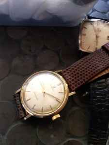 Omega 14k/ss Seamaster cross hair dial keeps time watch $650
