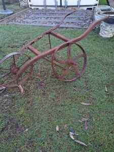 (SOLD) 2 X vintage iron wheels garden art?